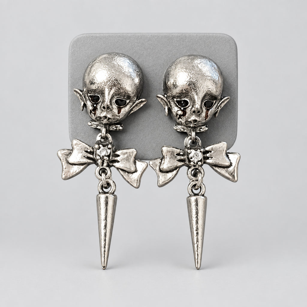 Gothic Creepy Doll Head Dangle Earrings, Antique Silver Elf Baby with Bow & Spike Charm, Dark Horror Punk Statement Earrings